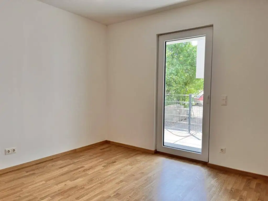Exklusive 3-Zimmer-Terrassenwohnung mit eigenem Gartenanteil