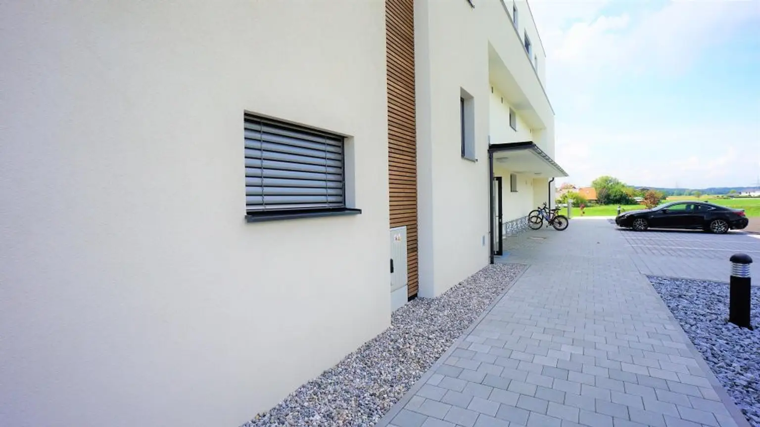 Beeindruckende 3 Zimmerwohnung mit großer Dachterrasse, Carportplatz und Stellplatz
