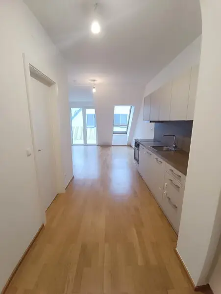 Neubau! Siedlung Rustenfeld! 2-Zimmer Wohnung im DG mit Dachterrasse! ! Stellplatz in Tiefgarage optional verfügbar!