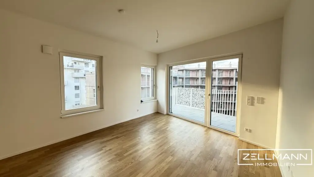 Rückzugsort über den Dächern – Erstbezug mit Loggia & Gemeinschaftsterrasse | ZELLMANN IMMOBILIEN