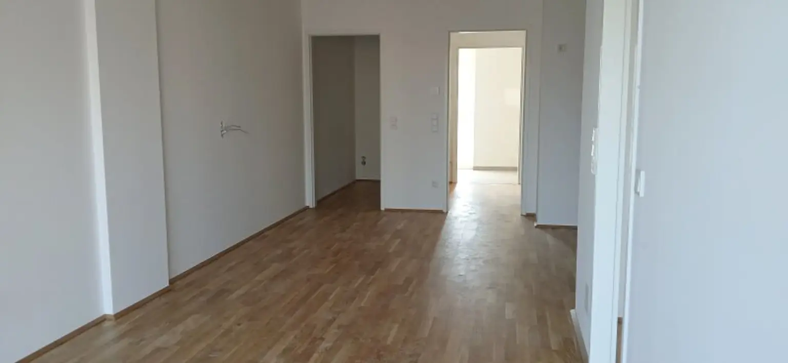 ERSTBEZUG - NEUBAU - Wunderschöne Wohnungen mit eigenem Tiefgaragenplatz im Stadtteil Neustadt