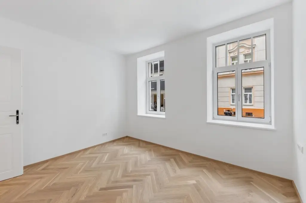 3-Zimmer-Altbaueigentumswohnung in generalsaniertem Altbau mit Terrasse und Garten