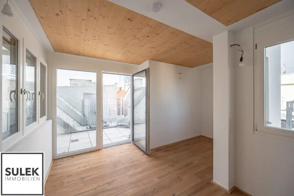 Erstbezug: 3-Zimmer-Maisonette mit hofseitiger Terrasse