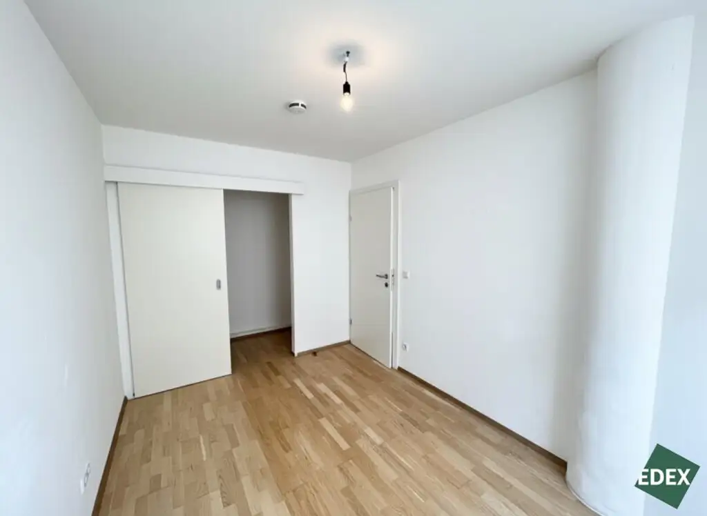 3-Zimmer-Neubau mit Loggia direkt bei der Donau