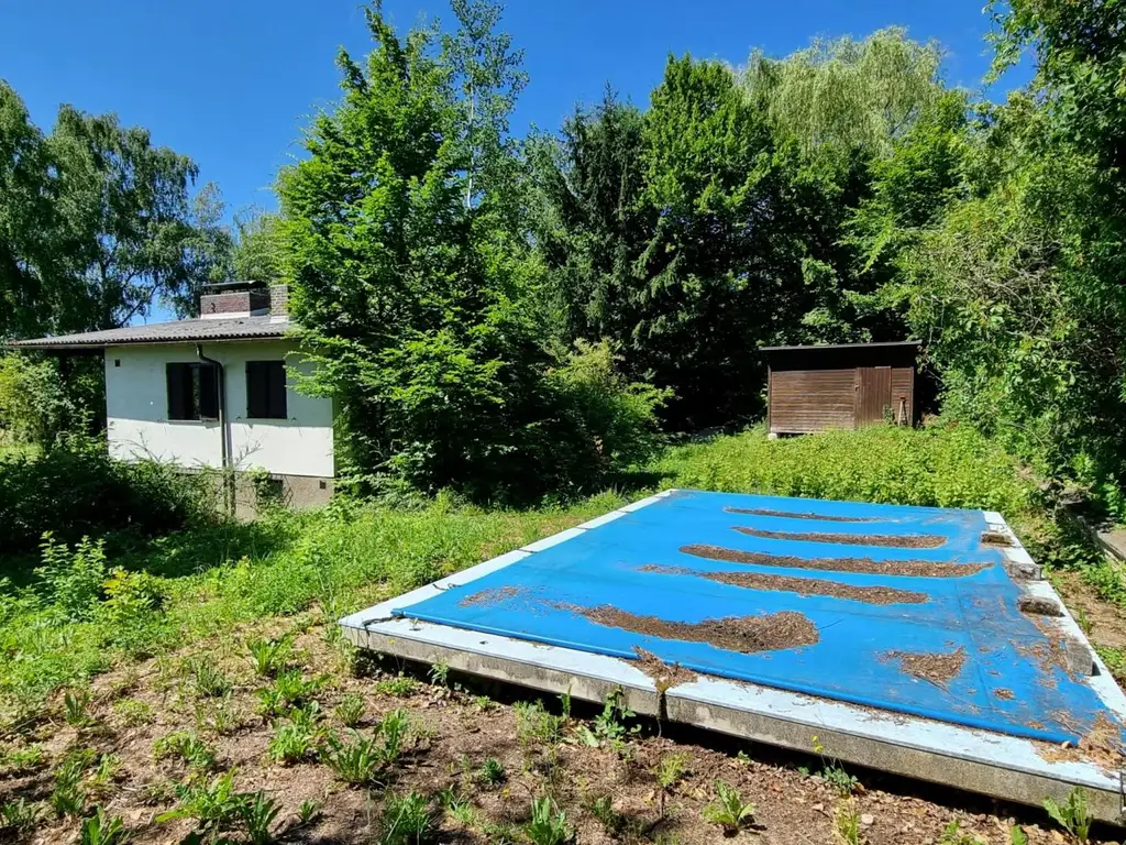 TRAUMHAFT SCHÖNES GRUNDSTÜCK MIT RENOVIERUNGSBEDÜRFTIGEM HAUS