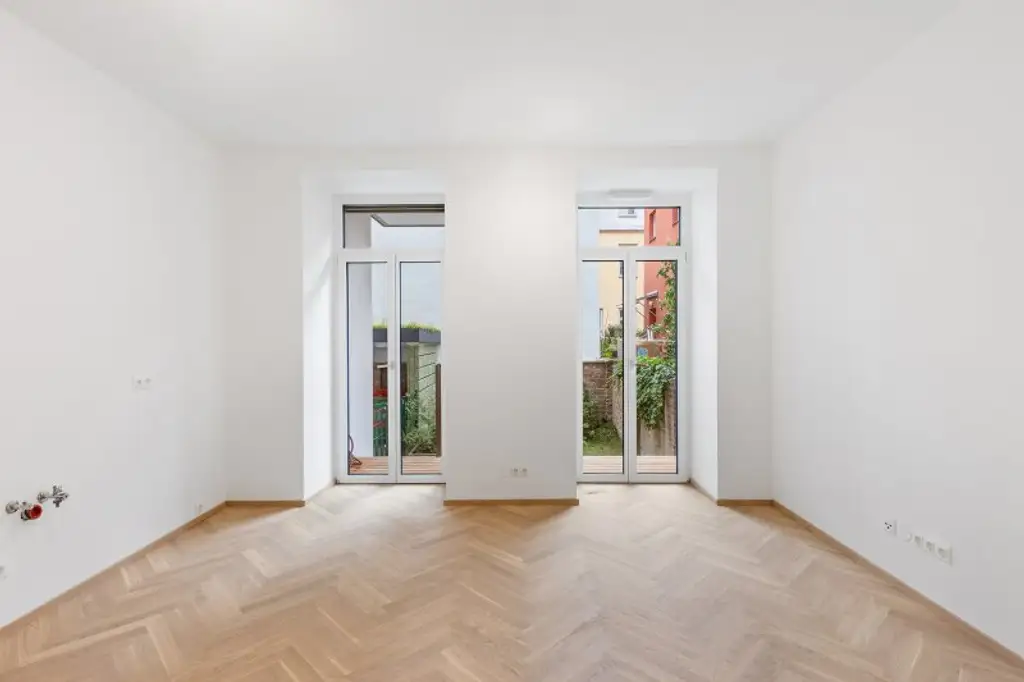 3-Zimmer-Altbaueigentumswohnung in generalsaniertem Altbau mit Terrasse und Garten