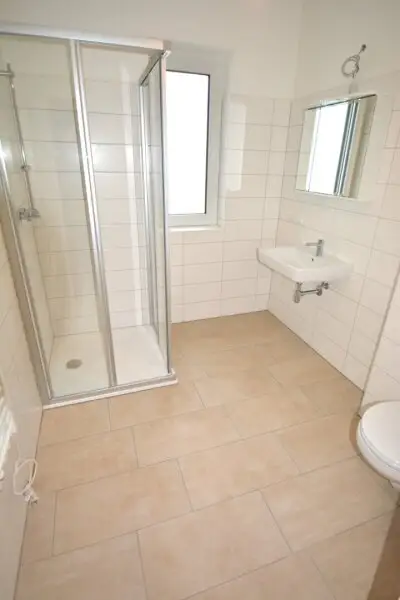 Neuwertige 2-Zimmer Wohnung mit moderner Einbauküche und Balkon in aufstrebendem Wohnviertel!