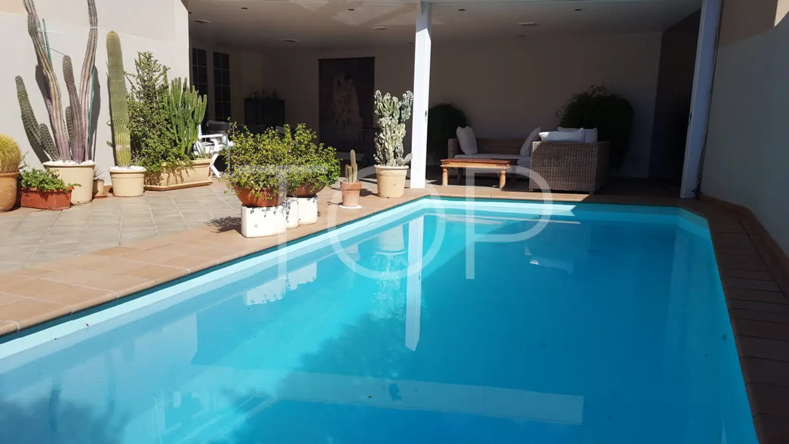 Amplia casa adosada con piscina privada y vistas al mar en Palm-Mar