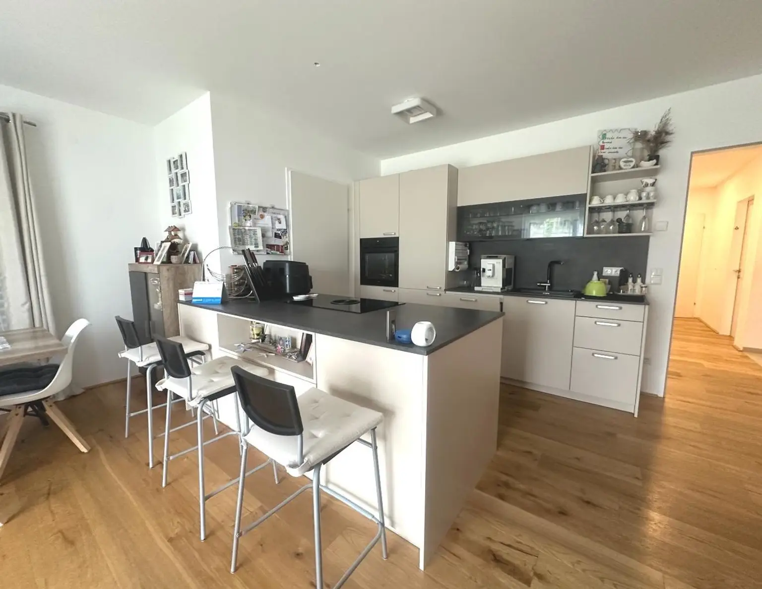 Vermietete Anlegerwohnung mit Garten - moderne Wohnqualität in ruhiger Lage