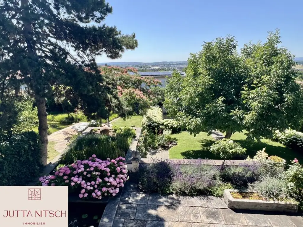 Exquisites Terrassenhaus in Eisenstadt, teilbares Grundstück – Ihr neues Zuhause mit Traumgarten, Naturpool und Weitblick!