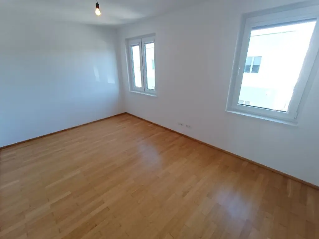 Neubau! Siedlung Rustenfeld! 4-Zimmer Wohnung mit traumhaftem Ausblick auf rund 103 m² mit Balkon!