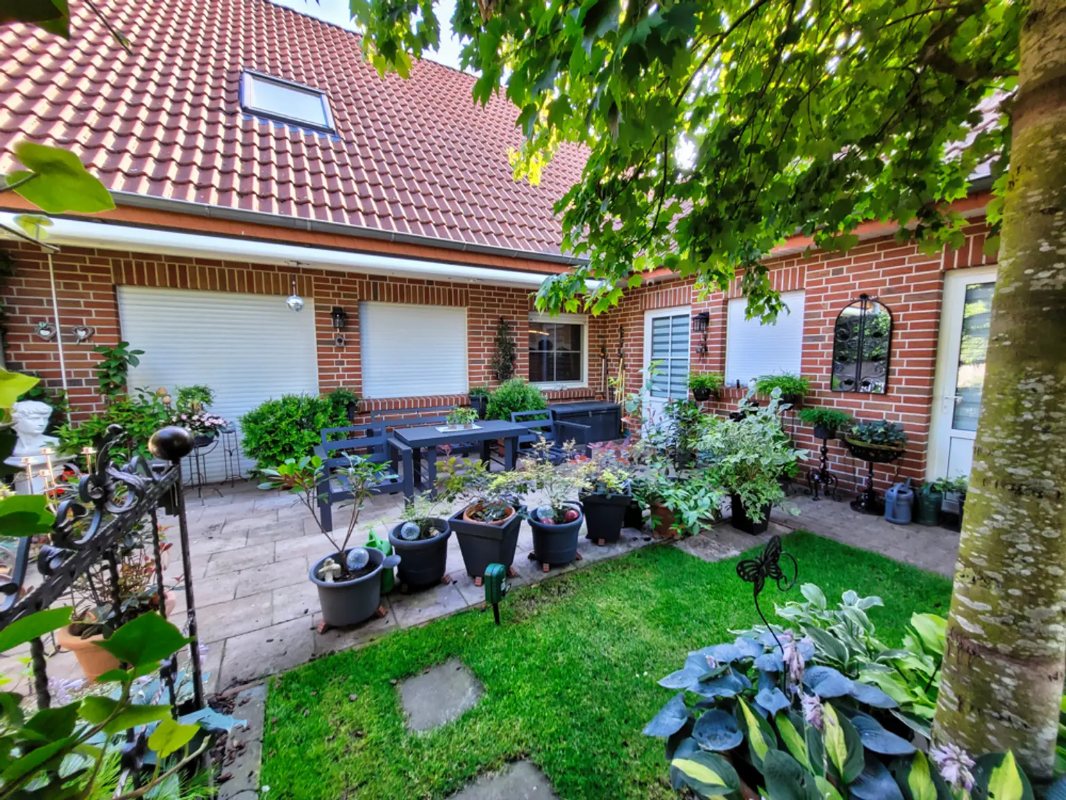 Einfamilienhaus mit traumhafter Gartenanlage in Niederlangen!