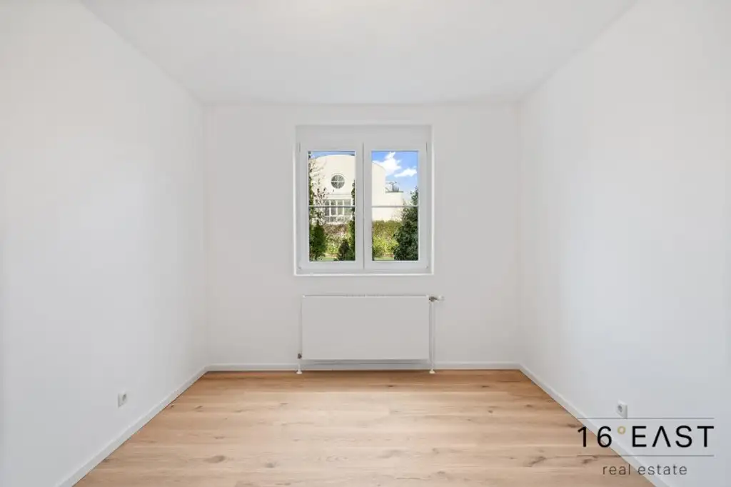 Exklusive 5-Zimmer Garten-Maisonette in Grünruhelage mit Fernblick und Garage