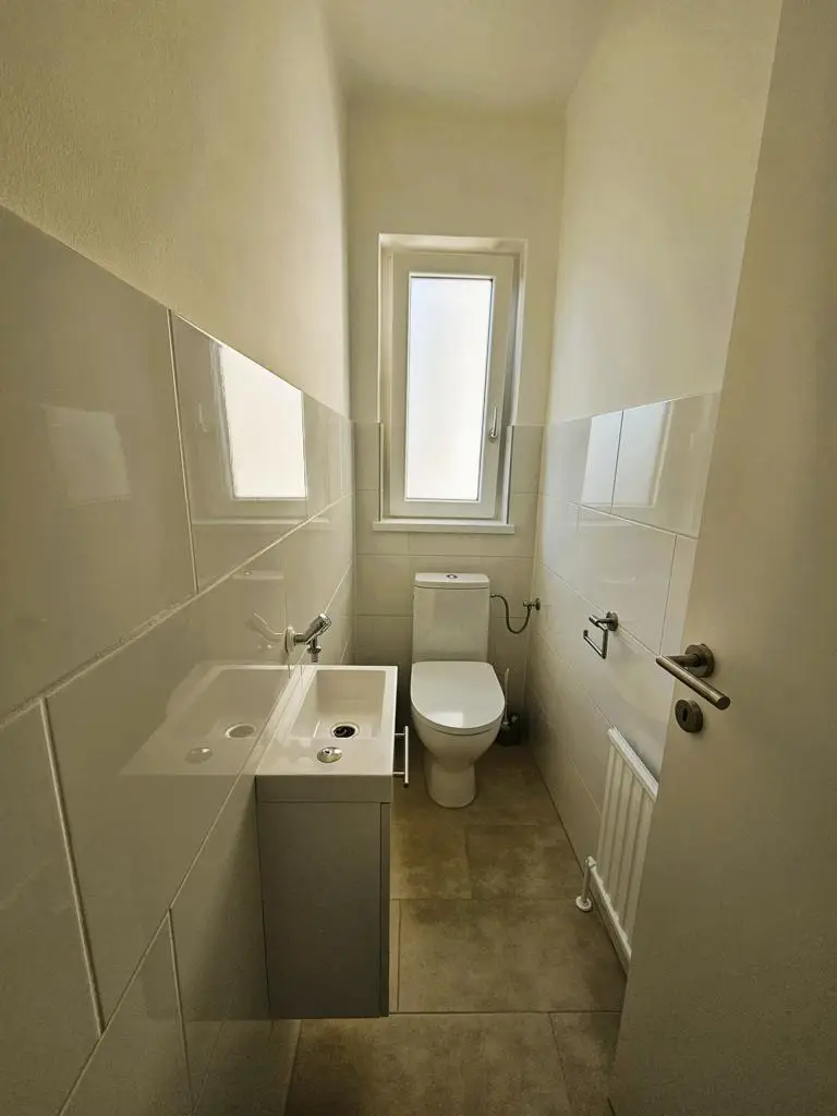 Top sanierte 3-Zimmer-Wohnung mit neuer Küche und Garage!