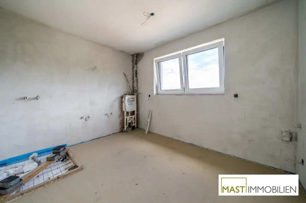 ERSTBEZUG - Modernes Einfamilienhaus mit 148 m² Wohnfläche, Balkon, Terrasse & 2 PKW-Stellplätzen in Strasshof – belagsfertig!