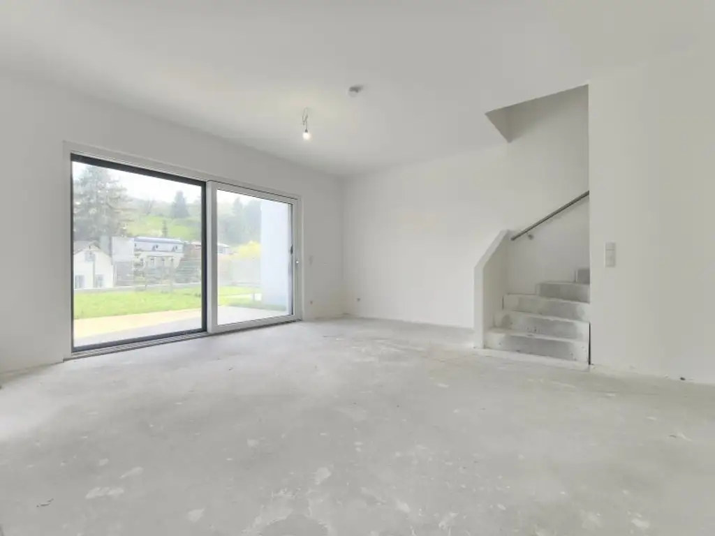 LEBENSQUALITÄT MIT AUSSICHT - EXKLUSIVES TOWNHAUS AUF EIGENGRUND IN WEIDLING – NATURNAHES WOHNEN MIT STIL