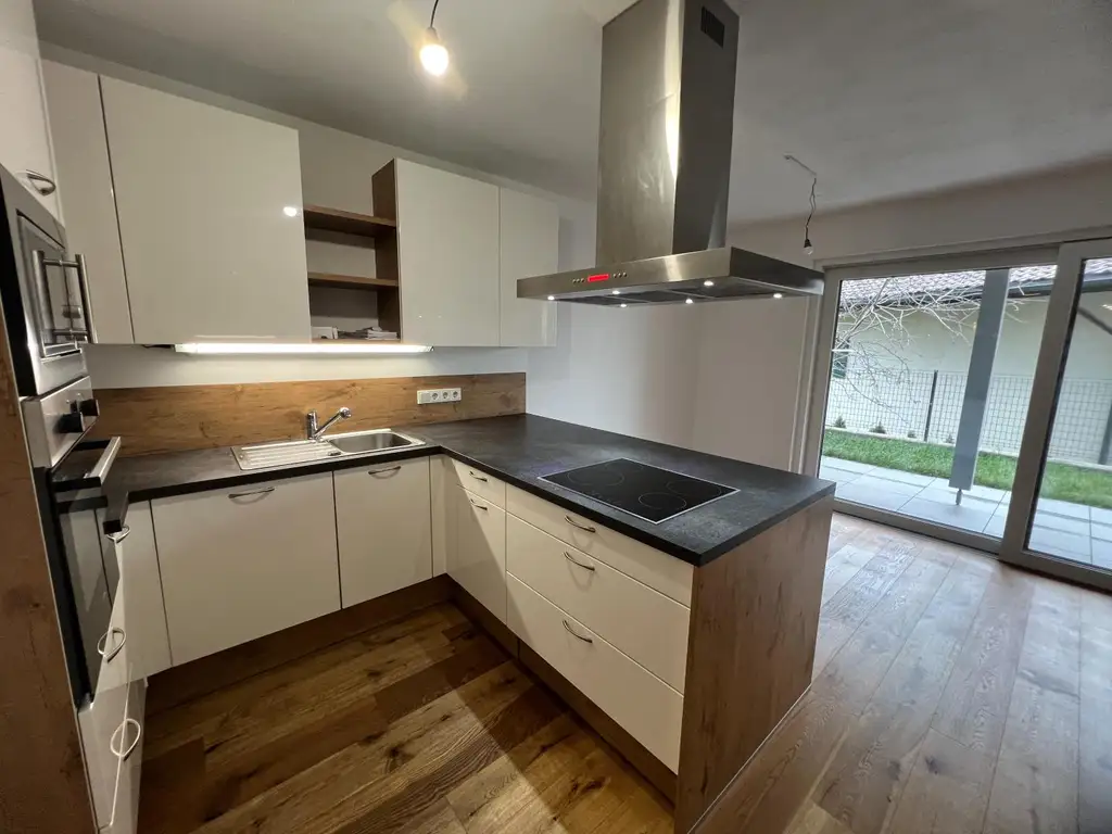 Exklusive 3 Zimmer Neubauwohnung mit XXL-Eigengarten, 2 KFZ - Abstellplätze in St. Georgen - nur wenige Minuten zum Attersee