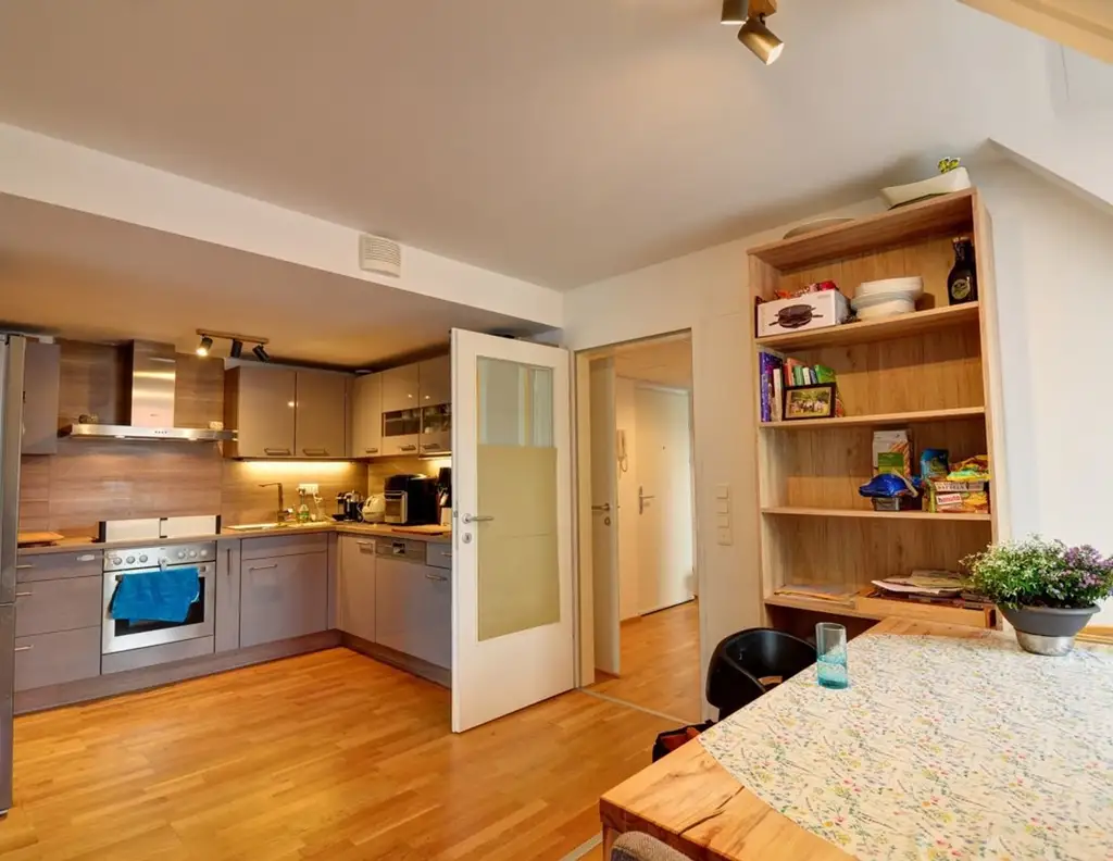 Dachgeschosswohnung mit Balkon, Garten, Lift und Tiefgaragenplatz - vermietet bis Ende 2026
