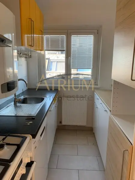 Lichtdurchflutete 2-Zimmer-Dachgeschosswohnung mit 40 m² Terrasse in ruhiger Lage