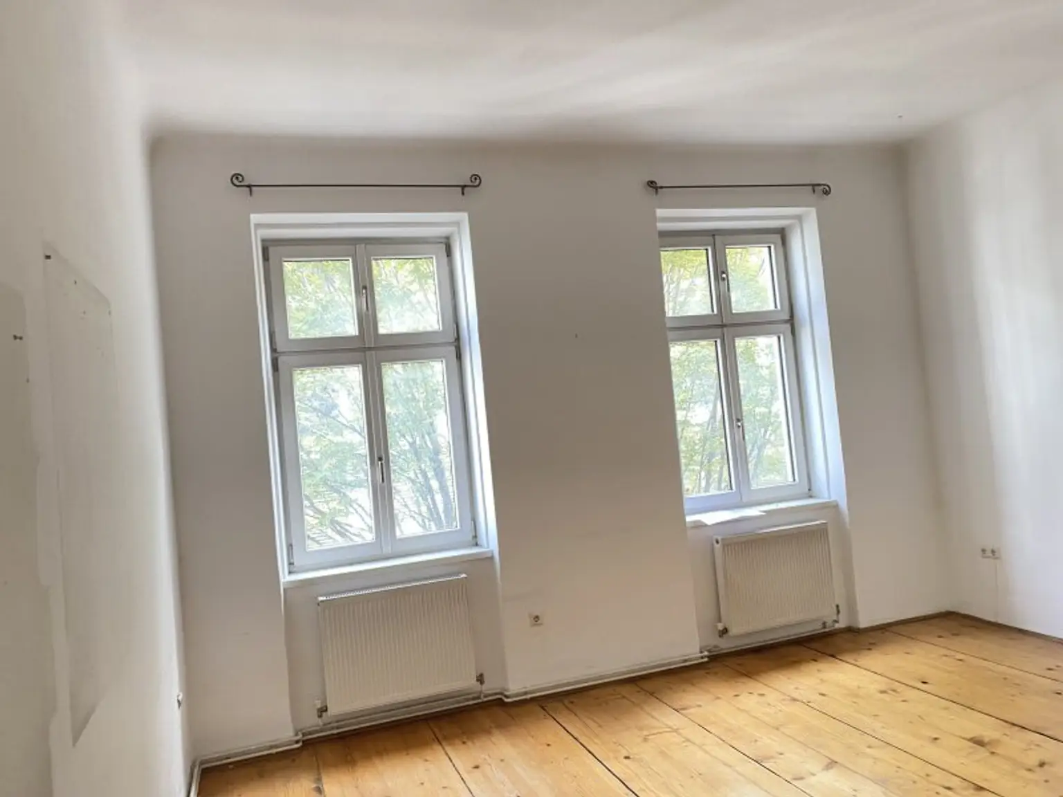 Mittelzinshaus mit bewilligten Dachbodenausbau
