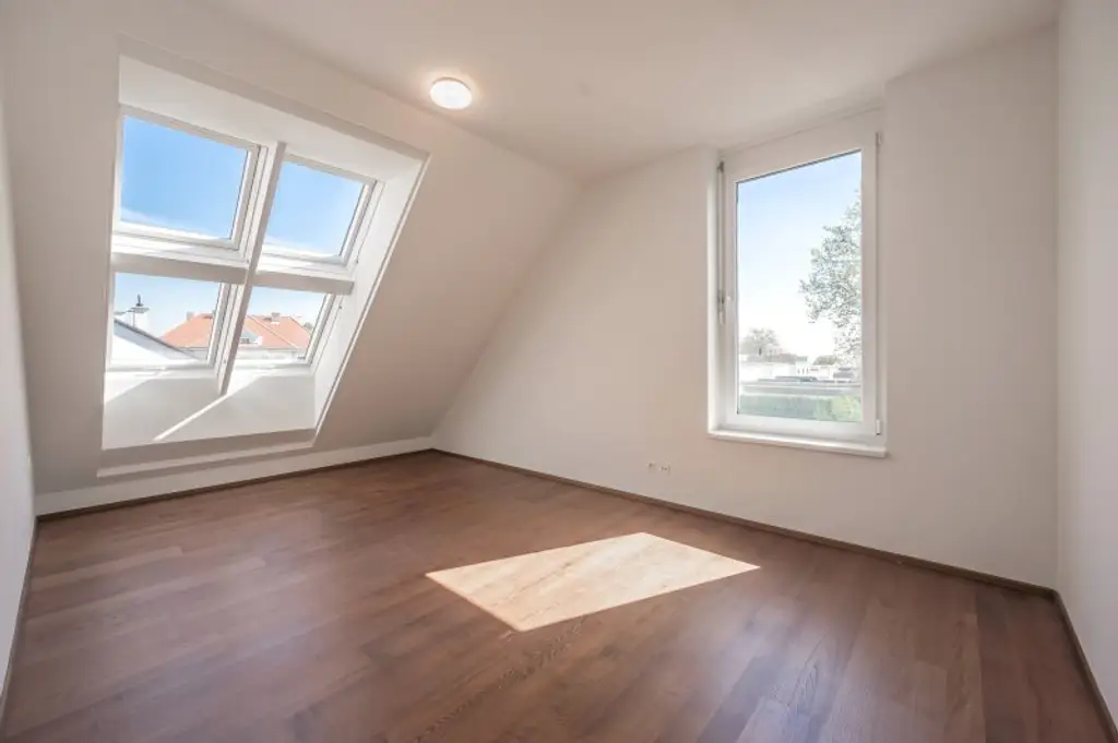 Panoramaliebling: Luxuriöse DG-Wohnung mit Dachterrasse und Fernblick