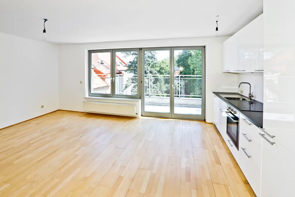 Ruhige, großzügige 2-Zimmer-Wohnung mit Terrasse und Grünblick – attraktiv für Eigennutzer und Anleger
