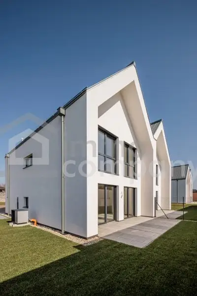 Moderne Doppelhaushälfte mit Garten und Wärmepumpe ( Top 1 )