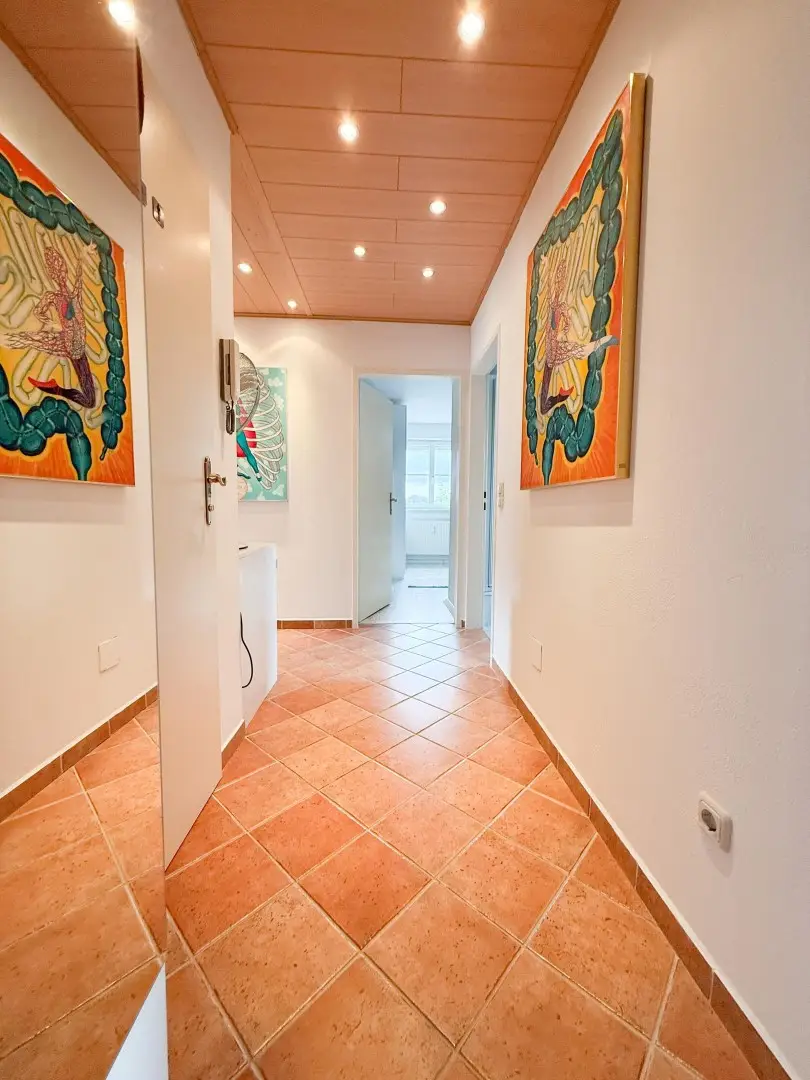 Charmante 3 Zimmer DG-Wohnung mit Carport-Stellplatz