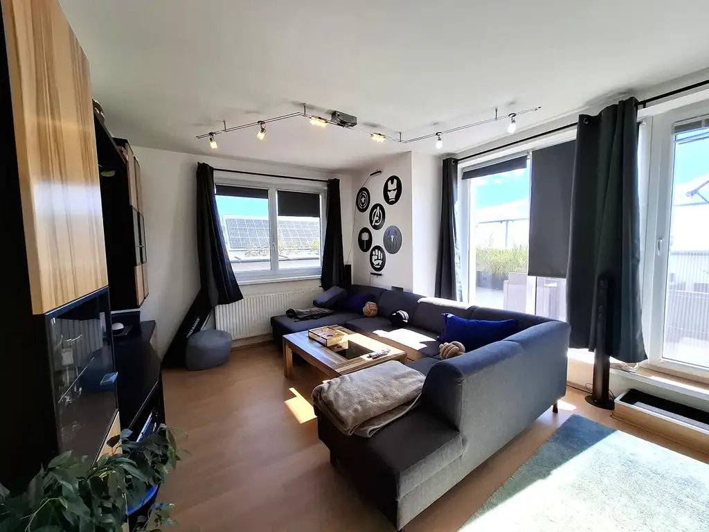 Moderne Eigentumswohnung mit 28 m² Dachterrasse in bester Lage