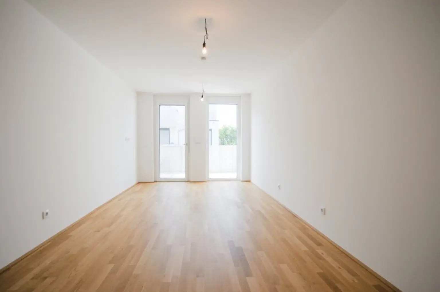 SCHÖNE 2-ZIMMER-WOHNUNG MIT SÜD-BALKON IM ERSTBEZUG
