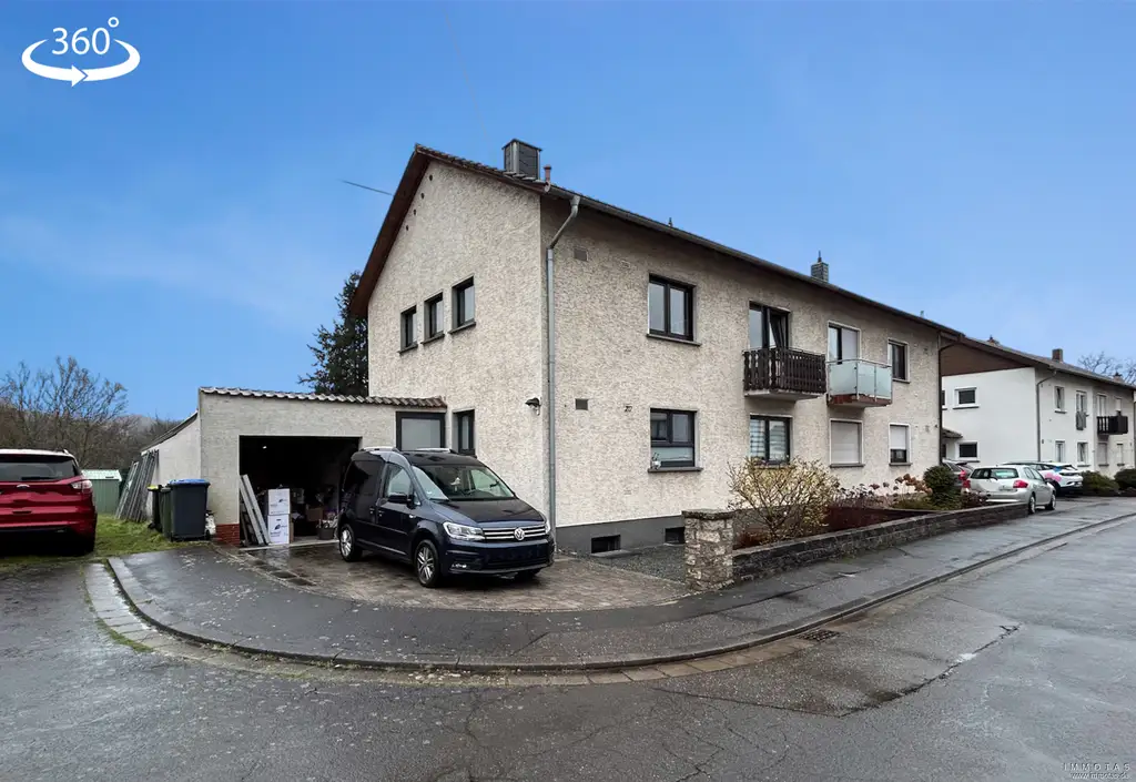 Doppelhaushälfte mit Garage und Garten in Völklingen-Ludweiler