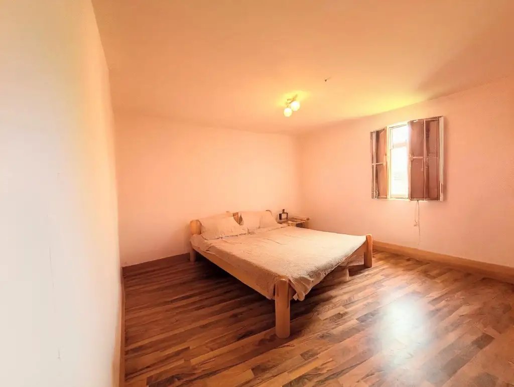 Sanierungsbedürftiger Bungalow mit großem Grundstück - in ruhiger, sonniger Lage