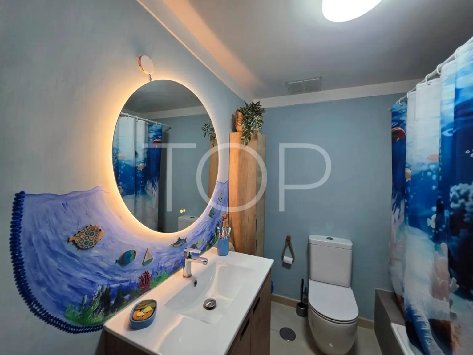 baño arriba