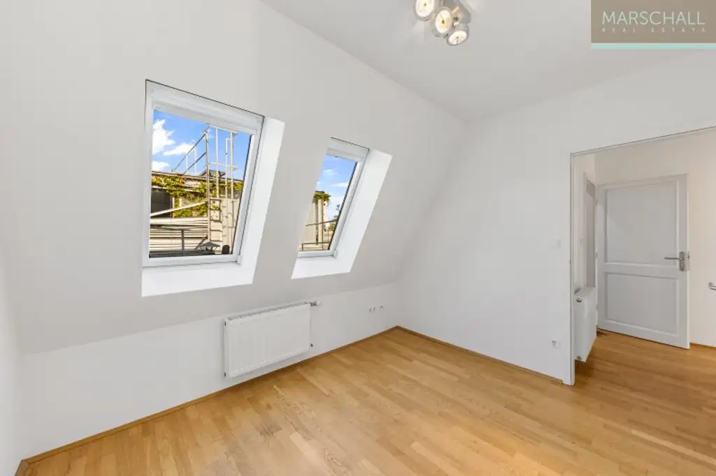 Helle 4-Zimmer-Dachgeschosswohnung mit traumhaftem Fernblick im 7. Bezirk