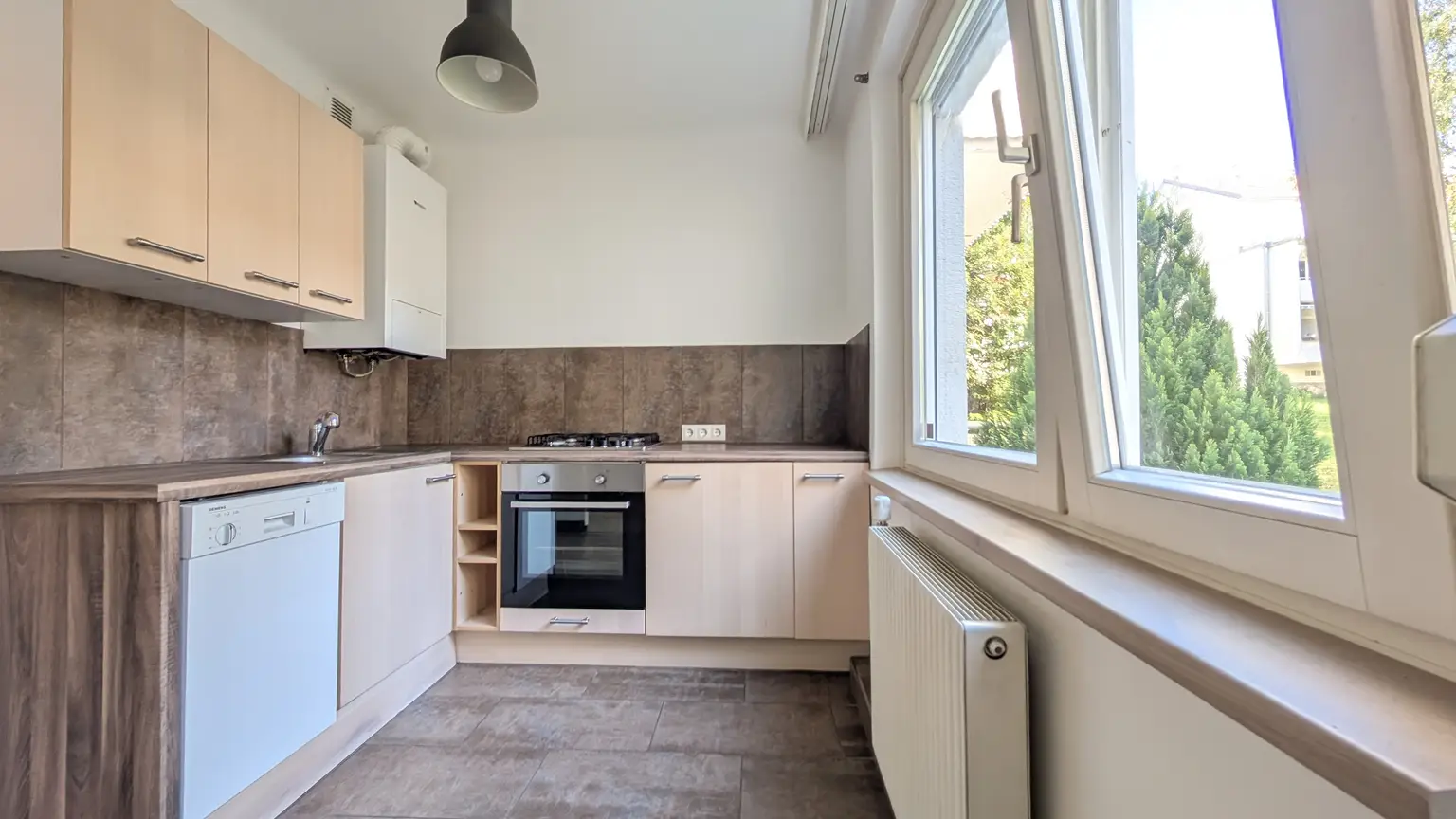 Nette Single-Garconniere mit Balkon in ruhiger und zentraler Grünlage am Rahthauspark Mauer !