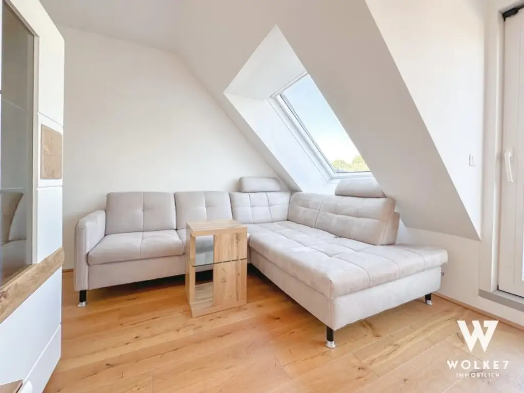 Exklusive 3-Zimmer-Dachgeschoss-Maisonette mit der Terrasse und Tiefgaragenplatz