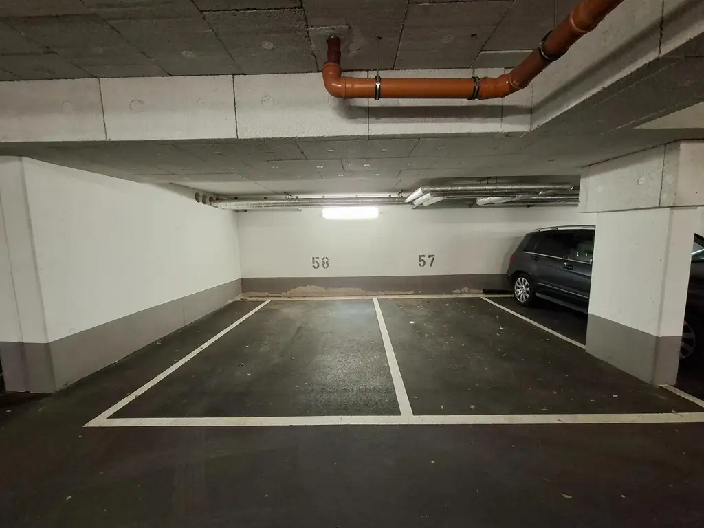 Moderne Eigentumswohnung mit 28 m² Dachterrasse in bester Lage