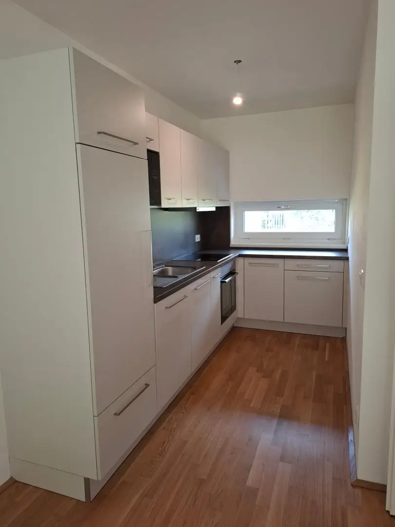 2-Zimmer-Wohnung mit Terrasse und Eigengarten und 2 Parkplätzen (1 x in Tiefgarage) zu vermieten