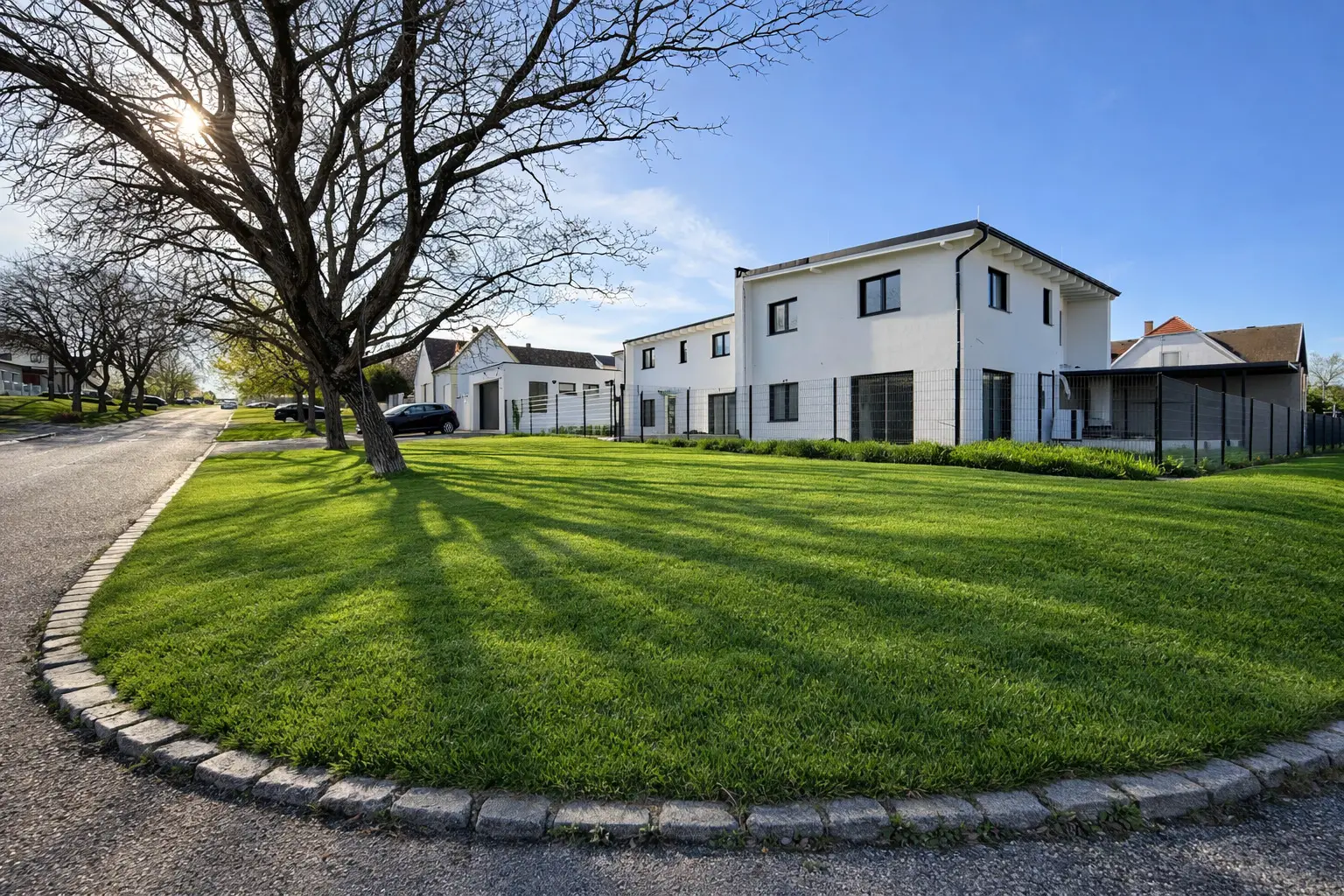 Wohnen mit Stil in Sigleß – Garage, Garten und Dachterrasse inklusive