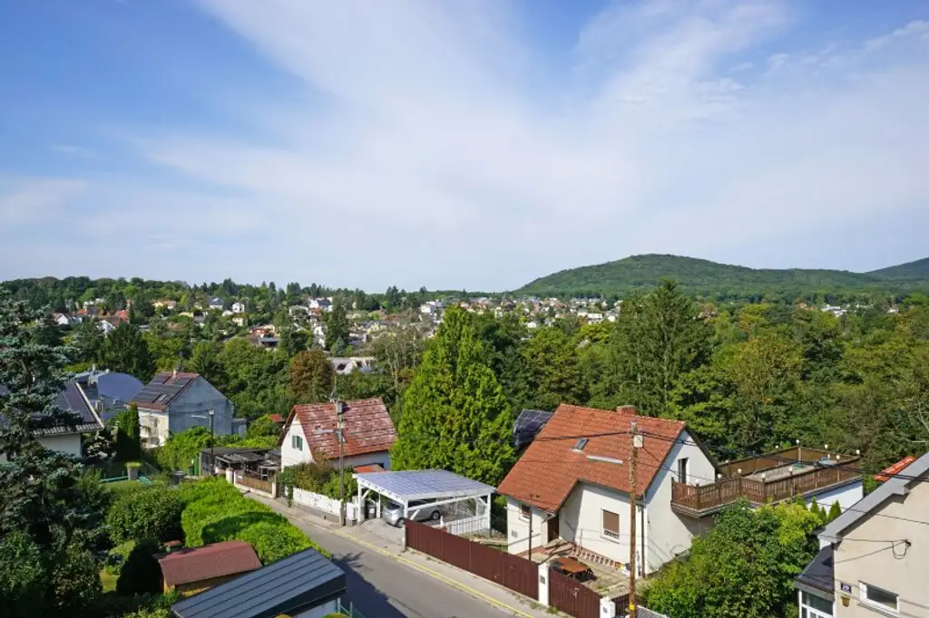 Satzberg: Exklusive Maisonettewohnung mit Stellplatz, kleinem Garten und Traum-Terrasse - ERSTBEZUG