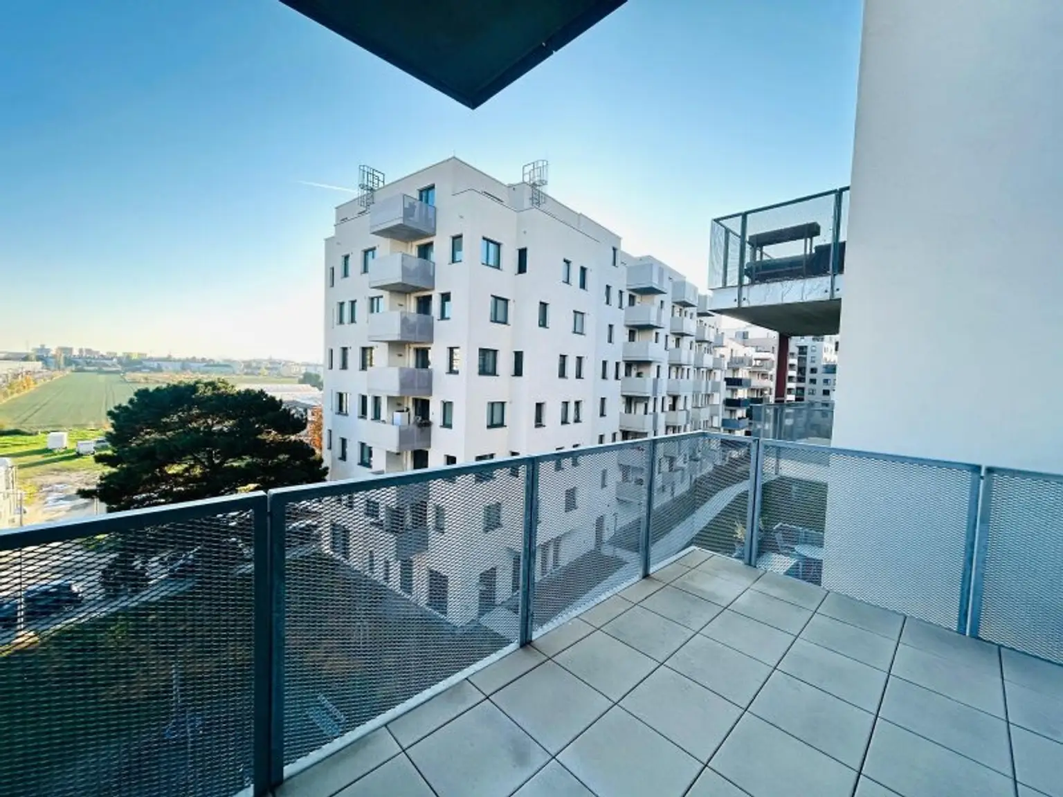 Modernes Neubau Refugium mit Grünblick & exklusiver Hausanlage | Partyraum | Fitnessraum