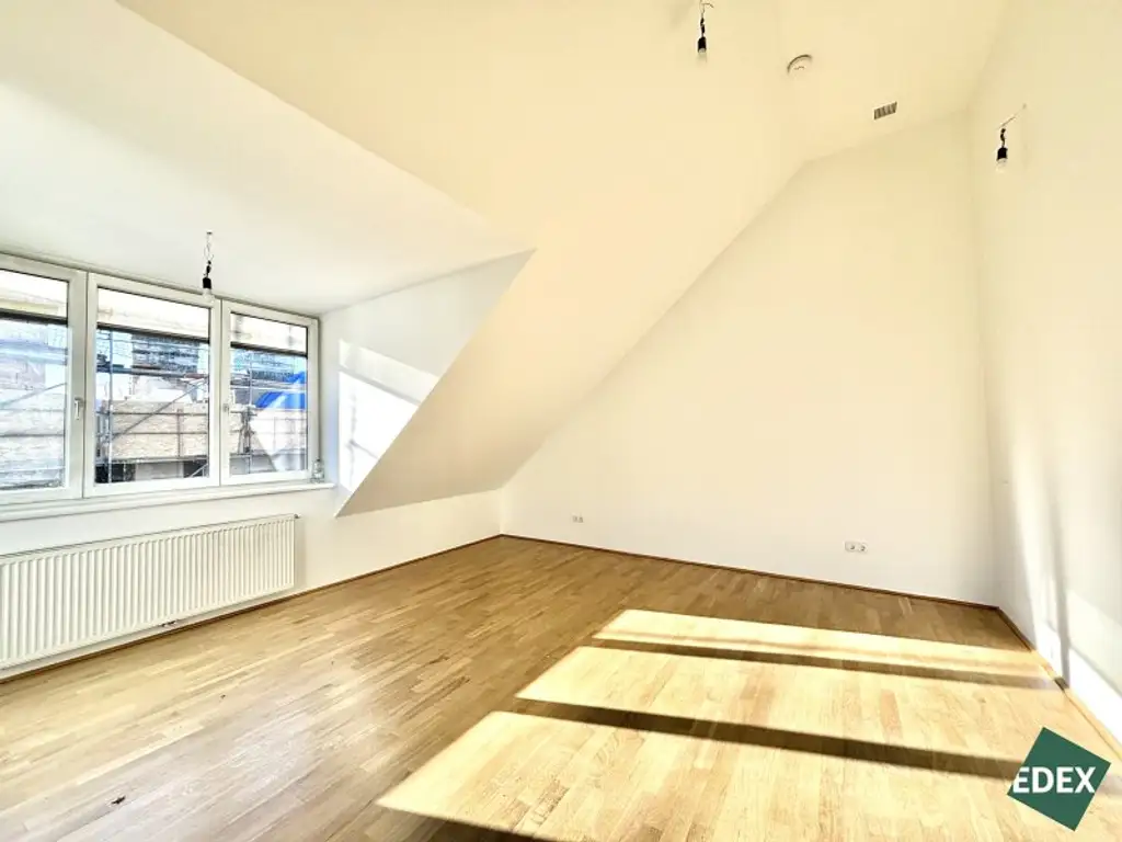 Charmante 2-Zimmer-Dachgeschosswohnung mit Süd-Terrasse und Kühlung nähe Arenbergpark