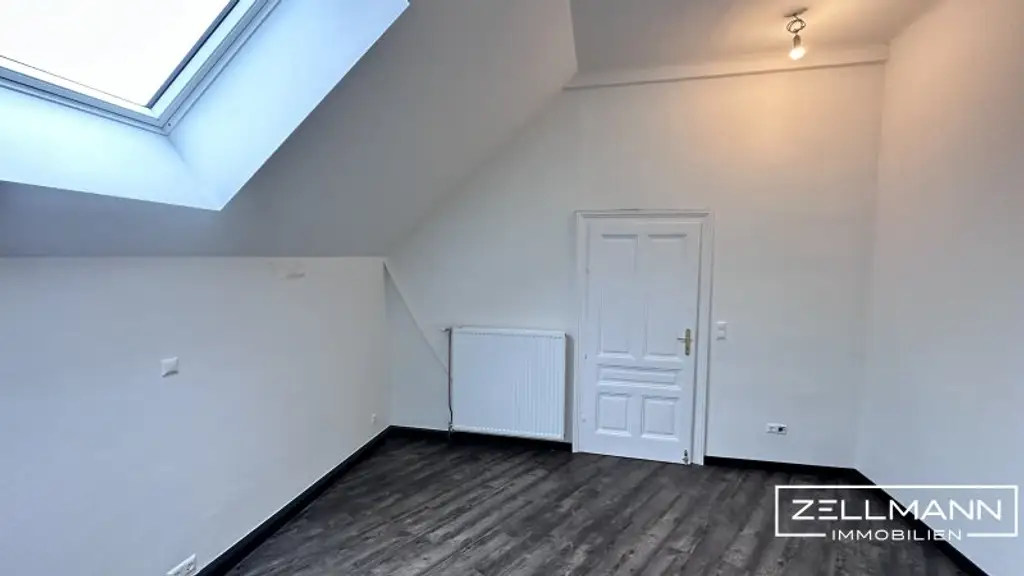 Exklusive Dachgeschosswohnung im Jugendstilhaus | ZELLMANN IMMOBILIEN