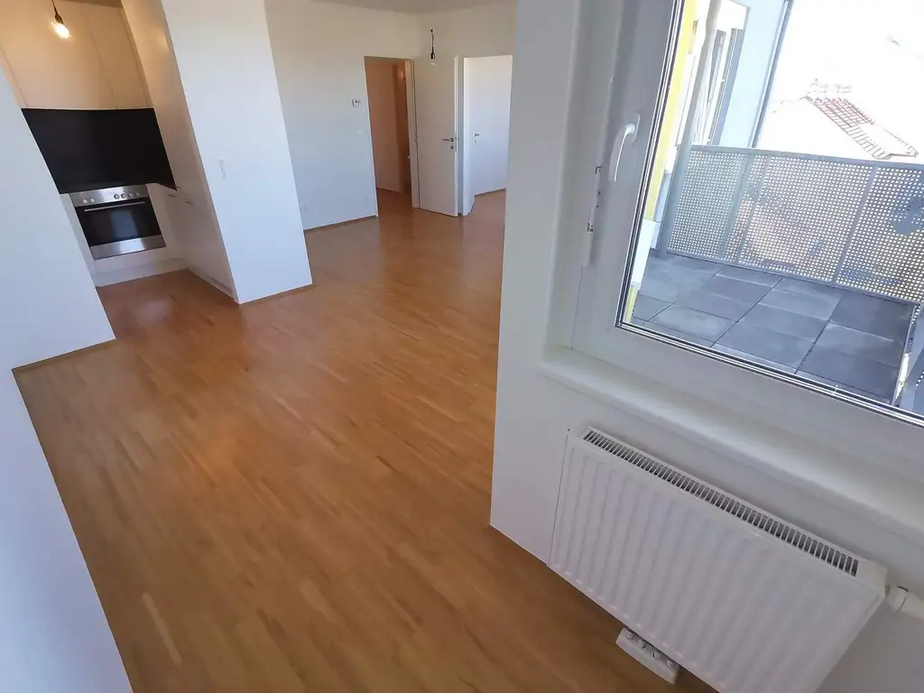 Weitblick über den Dächern Wiens - 2-Zimmer-Wohnung mit Balkon und Innenhofausrichtung