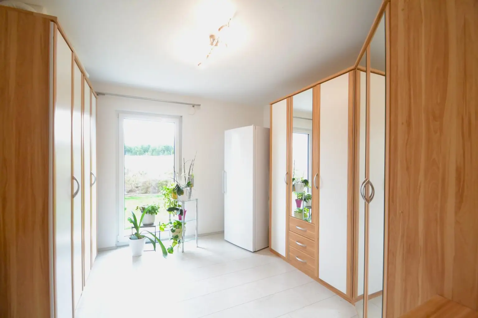 Zimmer mit Gartenausgang