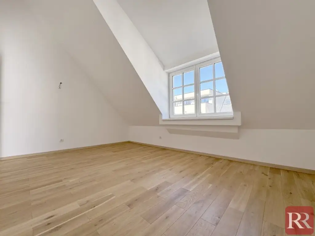 Moderne Dachgeschosswohnung mit hochwertiger Ausstattung und zentraler Lage