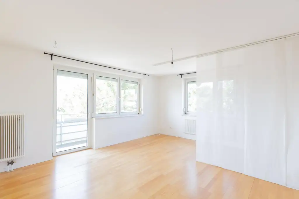 Ländlich grün und trotzdem Stadt? Diese Wohnung in Waltendorf macht's möglich!