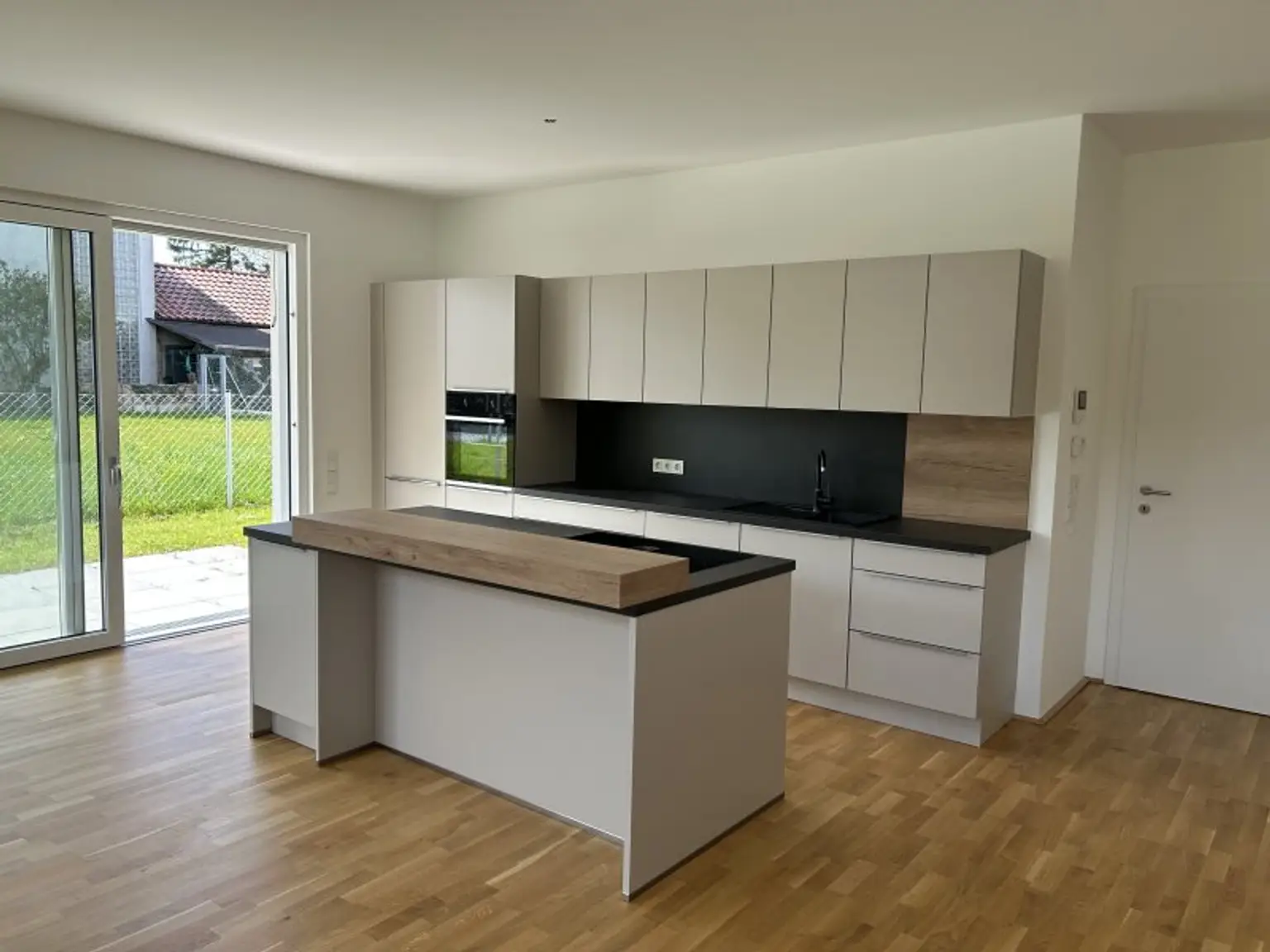 Perfekte Neubau Gartenwohnung | Steinhaus