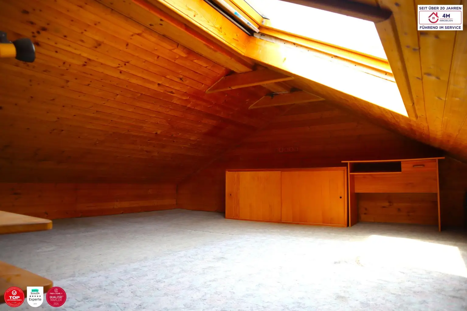 Schlafzimmer im Dachgeschoss des Gartenhauses