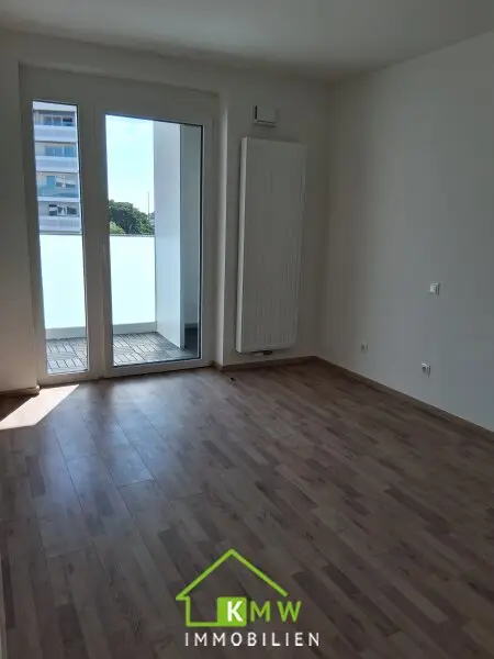 Erstbezug - Lichtdurchflutete 2 Zimmer Neubauwohnung mit Fernblick, Balkon & Tiefgaragenplatz